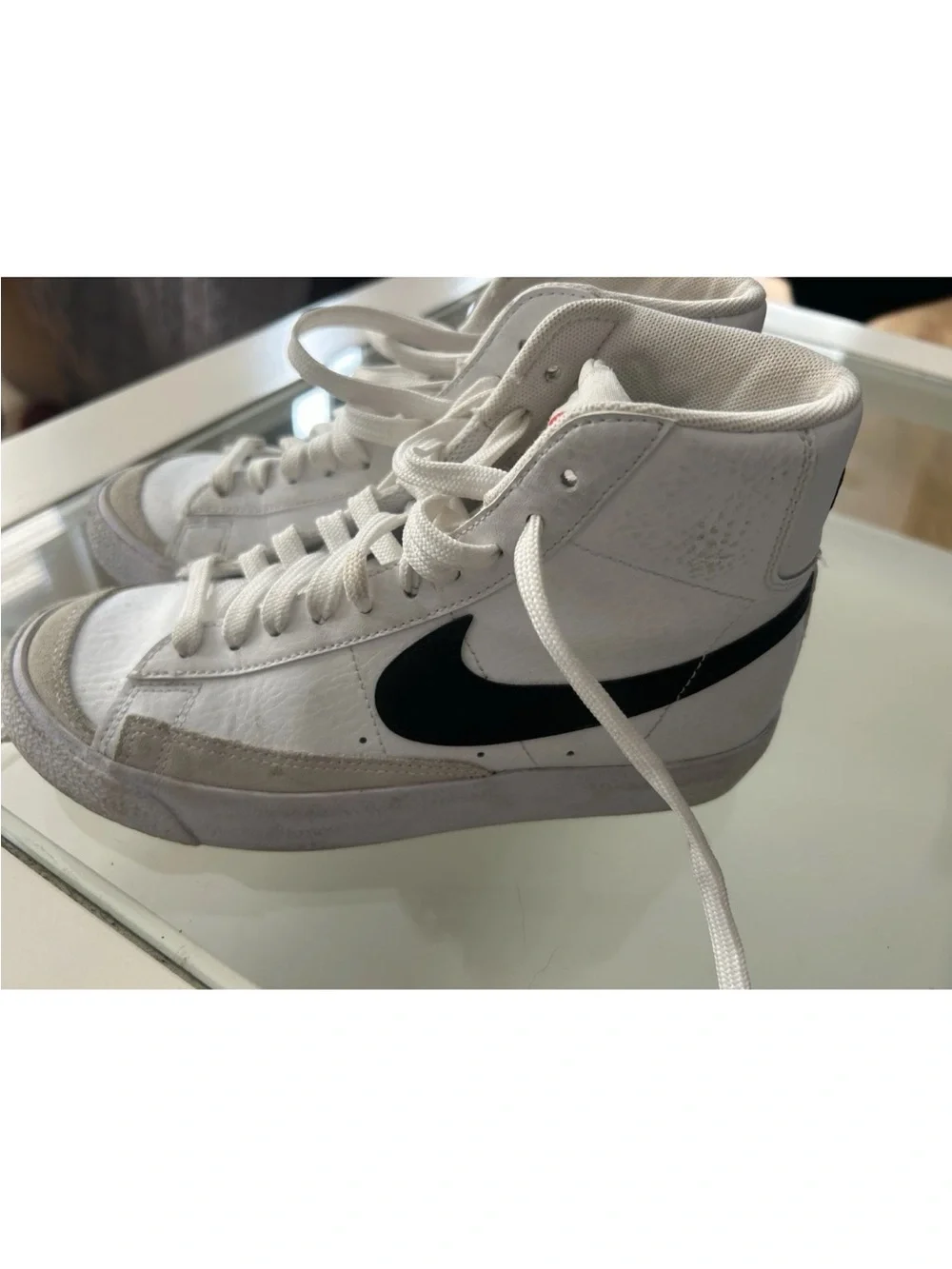 Nike White High-Top Sneakers with Black Swoosh and Red Logo